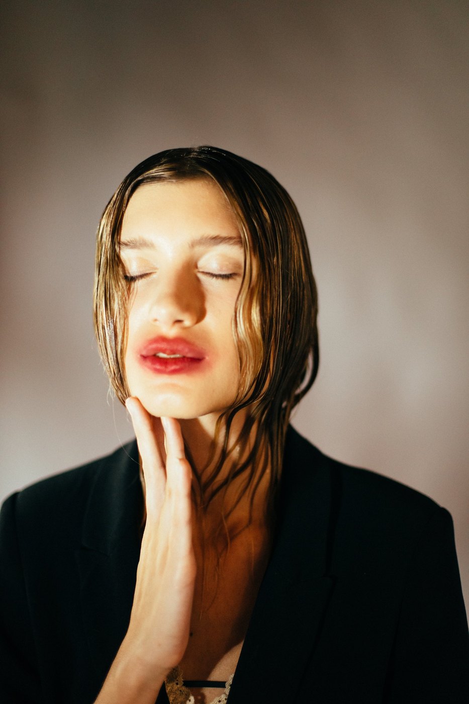 Portrait with wet hair and eyes closed